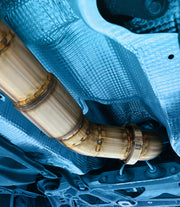 G-Sport Gen2 catalytic converters installed in dual exhaust, underbody view | Ace Race Parts